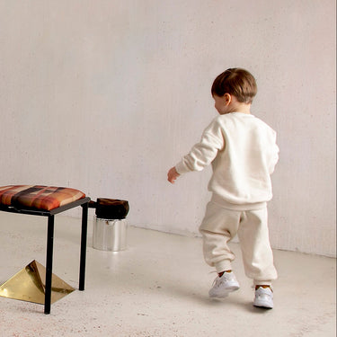 Pull évolutif blanc (tailles variées)