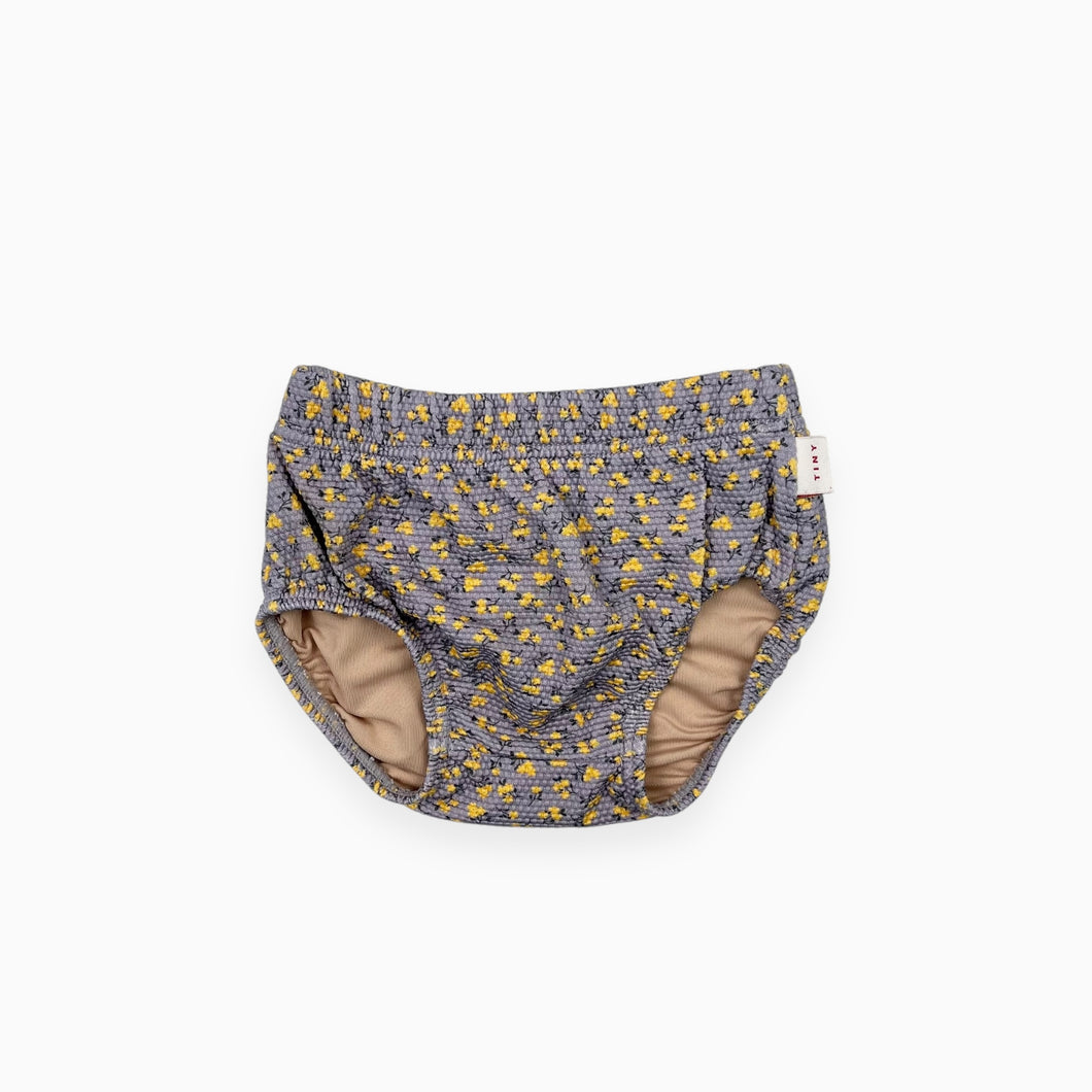 Bas de maillot lilas à motif floral jaune 6M