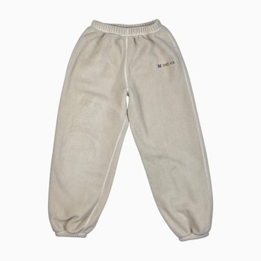 Jogger vanille en polar 'more luck' 140CM 10Y
