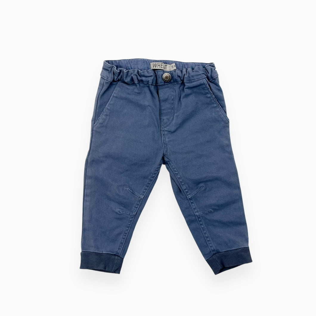 Pantalon bleu en coton bio extensible 12M