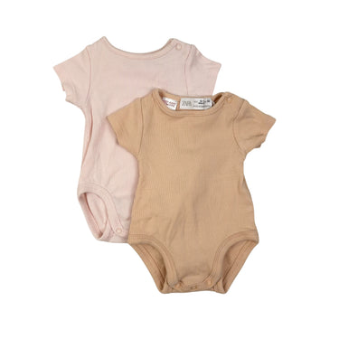 Duo de cache-couches pastel pêche et rose 0-1M